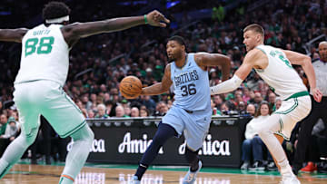 Memphis Grizzlies guard Marcus Smart (36) drives to the basket during the second half against the Boston Celtics at TD Garden.