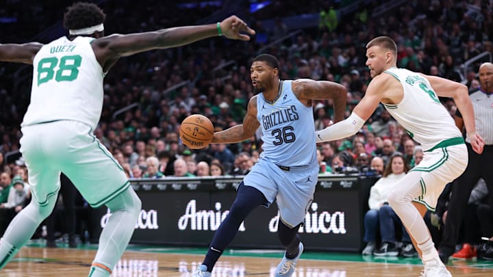 Memphis Grizzlies guard Marcus Smart (36) drives to the basket during the second half against the Boston Celtics at TD Garden.