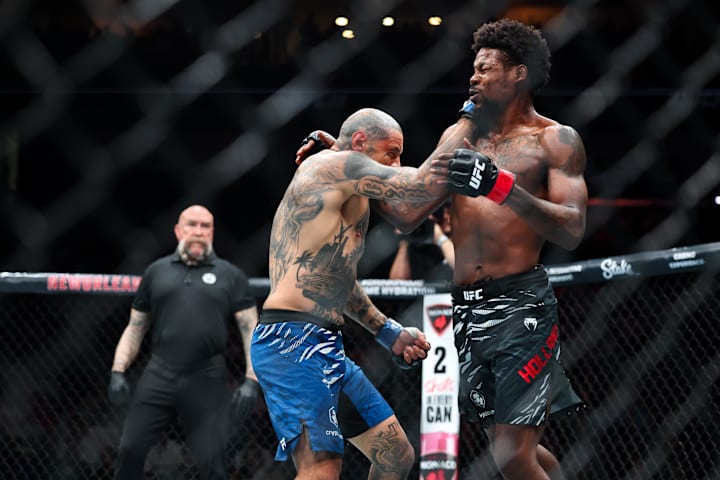 Kevin Holland fights against Daniel Rodriguez during UFC 318 at Smoothie King Center. 