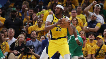 May 25, 2024; Indianapolis, Indiana, USA; Indiana Pacers center Myles Turner (33) grabs a rebound against the Boston Celtics during the fourth quarter of game three of the eastern conference finals in the 2024 NBA playoffs at Gainbridge Fieldhouse. Mandatory Credit: Trevor Ruszkowski-USA TODAY Sports