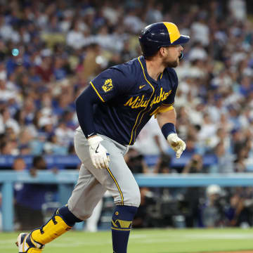 Milwaukee Brewers first baseman Rhys Hoskins (12) hits a grand slam during the fourth inning against the Los Angeles Dodgers at Dodger Stadium on July 5.