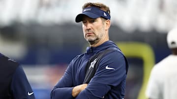 Sep 14, 2025; Arlington, Texas, USA; Dallas Cowboys head coach Brian Schottenheimer looks on during warmups before the game New York Giants at AT&T Stadium. Mandatory Credit: Kevin Jairaj-Imagn Images