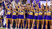 LSU Tigers cheerleaders during the school fight song against the Mississippi Rebels during the first half at Tiger Stadium. 