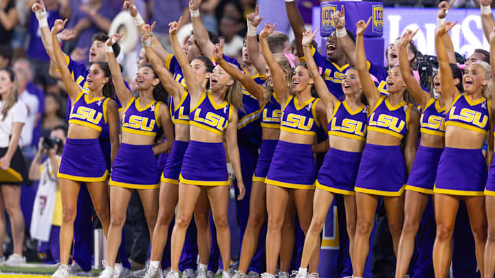 LSU Tigers cheerleaders during the school fight song against the Mississippi Rebels during the first half at Tiger Stadium. 