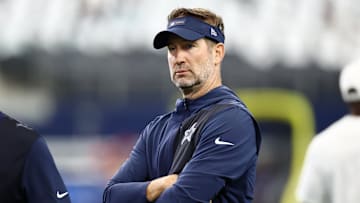Sep 14, 2025; Arlington, Texas, USA; Dallas Cowboys head coach Brian Schottenheimer looks on during warmups before the game New York Giants at AT&T Stadium. Mandatory Credit: Kevin Jairaj-Imagn Images