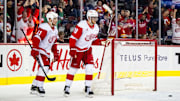Detroit Red Wings center Andrew Copp celebrates with right wing Vladimir Tarasenko