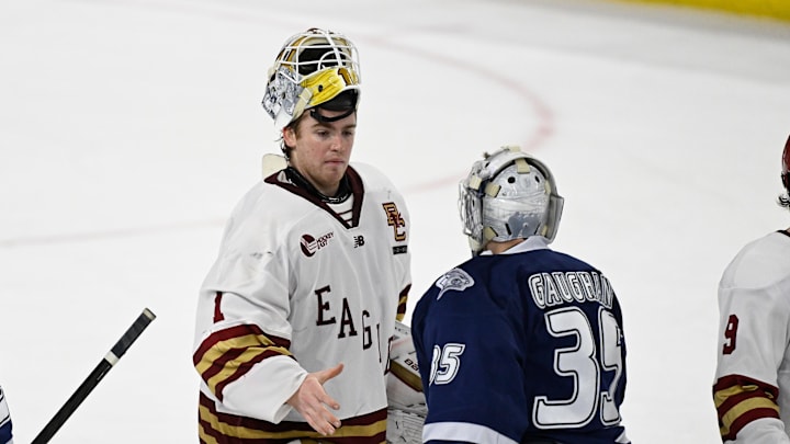 Feb 28, 2025; Chestnut Hill, MA, USA; Boston College goaltender Jacob Fowler (1) shakes hand with New Hampshire goaltender Raphael Gaughan (35) after defeating the Wildcats at Conte Forum. Mandatory Credit: Eric Canha-Imagn Images