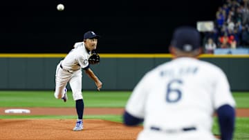Mar 27, 2025; Seattle, Washington, USA; Seattle Mariners former outfielder Ichiro Suzuki (51) throws out the ceremonial first pitch before a game against the Athletics at T-Mobile Park. Mandatory Credit: Joe Nicholson-Imagn Images