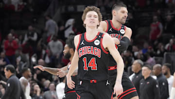 Apr 9, 2025; Chicago, Illinois, USA; Chicago Bulls forward Matas Buzelis (14) celebrates his three point basket against the Miami Heat during the second half at United Center. Mandatory Credit: David Banks-Imagn Images