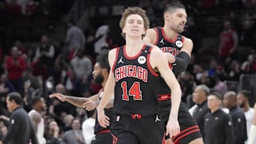 Apr 9, 2025; Chicago, Illinois, USA; Chicago Bulls forward Matas Buzelis (14) celebrates his three point basket against the Miami Heat during the second half at United Center. Mandatory Credit: David Banks-Imagn Images