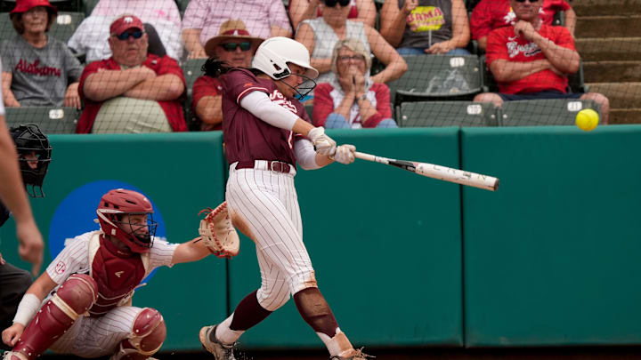 May 17, 2025; Tuscaloosa, AL, USA; Virginia Tech batter Cori McMillan connects with a pitch at Rhoads Stadium. Alabama defeated Virginia Tech 4-3 to advance to the final.
