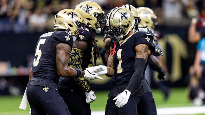 Sep 8, 2024; New Orleans, Louisiana, USA;  New Orleans Saints cornerback Alontae Taylor (1) celebrates a sack against Carolina Panthers quarterback Bryce Young (9) during the first half at Caesars Superdome. Mandatory Credit: Stephen Lew-Imagn Images