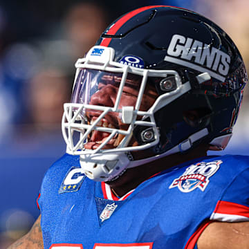 Nov 3, 2024; East Rutherford, New Jersey, USA; New York Giants defensive tackle Dexter Lawrence II (97) reacts during introductions before the game against the Washington Commanders at MetLife Stadium. Mandatory Credit: Vincent Carchietta-Imagn Images