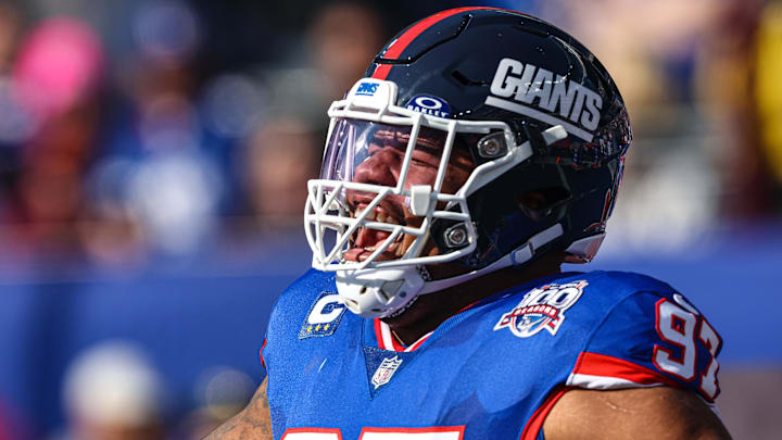 Nov 3, 2024; East Rutherford, New Jersey, USA; New York Giants defensive tackle Dexter Lawrence II (97) reacts during introductions before the game against the Washington Commanders at MetLife Stadium. Mandatory Credit: Vincent Carchietta-Imagn Images