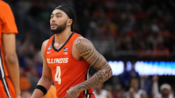 Mar 23, 2025; Milwaukee, WI, USA;  Illinois Fighting Illini guard Kylan Boswell (4) reacts after losing to the Kentucky Wildcats in the second round of the NCAA Tournament at Fiserv Forum.