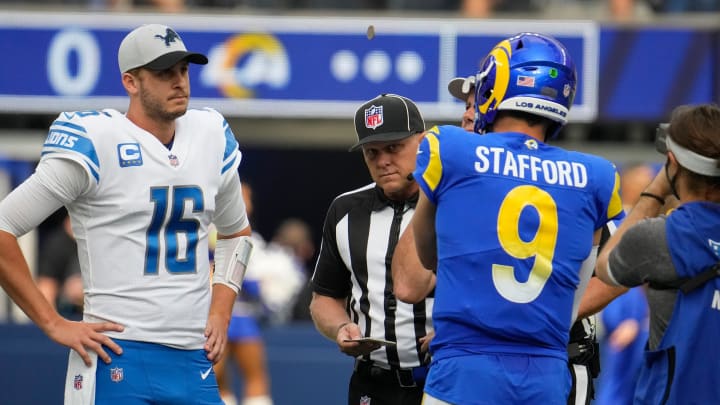 Oct 24, 2021; Inglewood, California, USA; Detroit Lions quarterback Jared Goff (16) and Los Angeles Rams quarterback Matthew Stafford (9) during the coin flip before the start of the Rams-Lions game at SoFi Stadium. Mandatory Credit: Robert Hanashiro-USA TODAY Sports