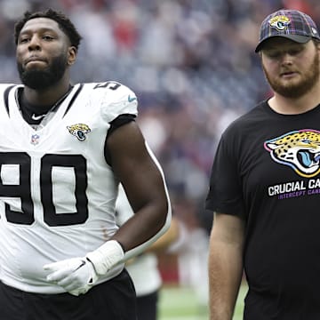 Sep 29, 2024; Houston, Texas, USA; Jacksonville Jaguars defensive tackle Esezi Otomewo (90) after the game against the Houston Texans at NRG Stadium. Mandatory Credit: Troy Taormina-Imagn Images