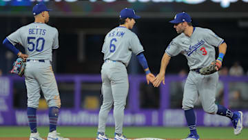 May 5, 2025; Miami, Florida, USA; Los Angeles Dodgers left fielder Chris Taylor (3) celebrates with second baseman Hyeseong Kim (6) after the game against the Miami Marlins at loanDepot Park. Mandatory Credit: Sam Navarro-Imagn Images