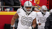 Dec 25, 2023; Kansas City, Missouri, USA; Las Vegas Raiders guard Dylan Parham (66) runs onto the field against the Kansas City Chiefs prior to a game at GEHA Field at Arrowhead Stadium. Mandatory Credit: Denny Medley-Imagn Images