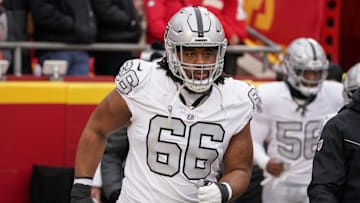 Dec 25, 2023; Kansas City, Missouri, USA; Las Vegas Raiders guard Dylan Parham (66) runs onto the field against the Kansas City Chiefs prior to a game at GEHA Field at Arrowhead Stadium. Mandatory Credit: Denny Medley-Imagn Images