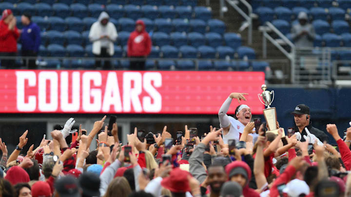 Sep 14, 2024; Seattle, Washington, USA; Washington State Cougars quarterback John Mateer (10) celebrates after defeating the Washington Huskies at Lumen Field. Mandatory Credit: Steven Bisig-Imagn Images