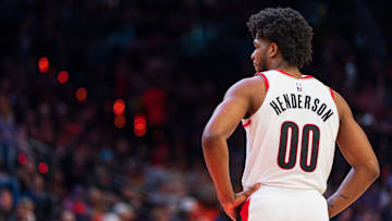 Dec 15, 2024; Phoenix, Arizona, USA; Portland Trail Blazers guard Scoot Henderson (G) watches on between plays in the first half during a game during a game against the Phoenix Suns at Footprint Center. Mandatory Credit: Allan Henry-Imagn Images