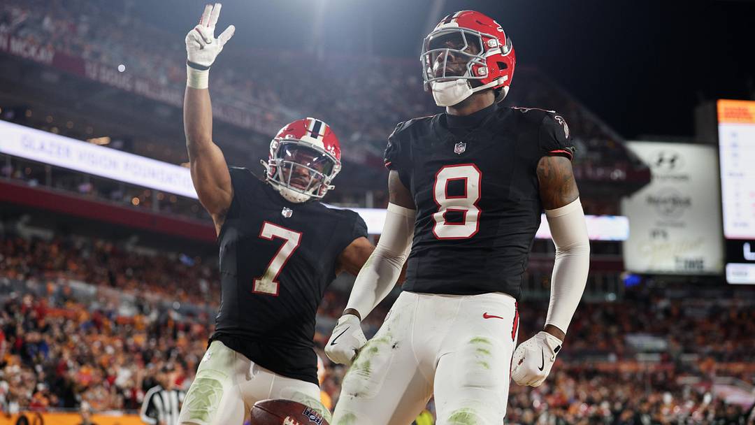 Dec 11, 2025; Tampa, Florida, USA; Atlanta Falcons tight end Kyle Pitts Sr. (8) celebrates with running back Bijan Robinson (7) after scoring a touchdown against the Tampa Bay Buccaneers during the second quarter at Raymond James Stadium. Mandatory Credit: Nathan Ray Seebeck-Imagn Images