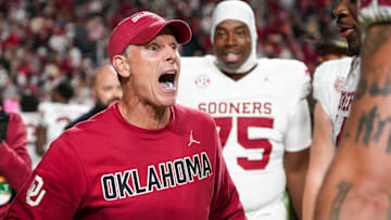 Oklahoma coach Brent Venables celebrates with his players after his team beat Tennessee at Neyland Stadium in Knoxville, Tenn., on November 1.
