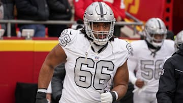 Dec 25, 2023; Kansas City, Missouri, USA; Las Vegas Raiders guard Dylan Parham (66) runs onto the field against the Kansas City Chiefs prior to a game at GEHA Field at Arrowhead Stadium. Mandatory Credit: Denny Medley-Imagn Images
