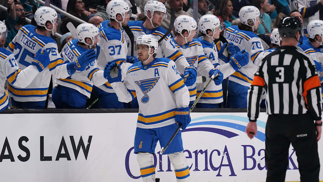 Mar 6, 2026; San Jose, California, USA; St. Louis Blues center Robert Thomas (18) is congratulated by teammates after scoring a goal against the San Jose Sharks in the second period at SAP Center at San Jose. Mandatory Credit: David Gonzales-Imagn Images Mar 6, 2026; San Jose, California, USA; St. Louis Blues center Robert Thomas (18) is congratulated by teammates after scoring a goal against the San Jose Sharks in the second period at SAP Center at San Jose. Mandatory Credit: David Gonzales-Imagn Images