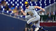 May 22, 2024; Miami, Florida, USA; Milwaukee Brewers outfielder Joey Wiemer (28) runs to second base against the Miami Marlins during the eighth inning at loanDepot Park. Mandatory Credit: Rich Storry-Imagn Images