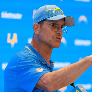 Jul 24, 2024; El Segundo, CA, USA;  Los Angeles Chargers head coach Jim Harbaugh speaks to the media after the first day of training camp at The Bolt. Mandatory Credit: Kiyoshi Mio-USA TODAY Sports