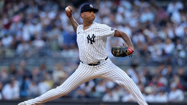Jun 9, 2024; Bronx, New York, USA; New York Yankees starting pitcher Luis Gil (81) pitches against the Los Angeles Dodgers during the first inning at Yankee Stadium. Mandatory Credit: Brad Penner-USA TODAY Sports