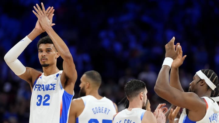 Aug 2, 2024; Villeneuve-d'Ascq, France; France power forward Victor Wembanyama (32) reacts after the loss against Germany in men’s group B basketball game during the Paris 2024 Olympic Summer Games at Stade Pierre-Mauroy. Mandatory Credit: John David Mercer-USA TODAY Sports