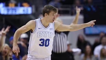 Mar 1, 2025; Provo, Utah, USA;  Brigham Young Cougars guard Dallin Hall (30) reacts to a play West Virginia Mountaineers during the second half at Marriott Center. Mandatory Credit: Rob Gray-Imagn Images