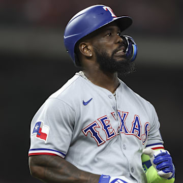 Jul 11, 2025; Houston, Texas, USA; Texas Rangers right fielder Adolis Garcia (53) reacts after a play during the game against the Houston Astros at Daikin Park. 