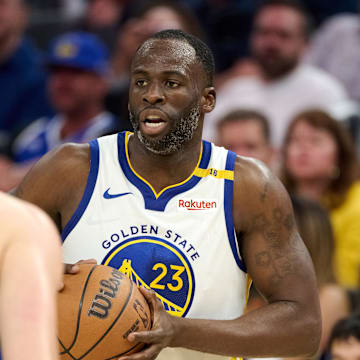 Golden State Warriors forward Draymond Green (23) controls the ball against LA Clippers center Ivica Zubac.