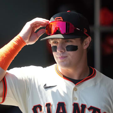 Aug 10, 2025; San Francisco, California, USA; San Francisco Giants right fielder Drew Gilbert (61) walks in the dugout before the game against the Washington Nationals at Oracle Park. Mandatory Credit: Darren Yamashita-Imagn Images