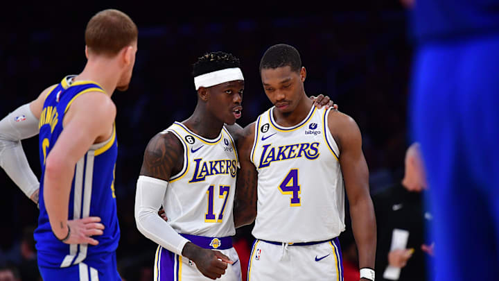 May 6, 2023; Los Angeles, California, USA; Los Angeles Lakers guard Dennis Schroder (17) speaks with guard Lonnie Walker IV (4) during the first half in game three of the 2023 NBA playoffs at Crypto.com Arena. Mandatory Credit: Gary A. Vasquez-Imagn Images