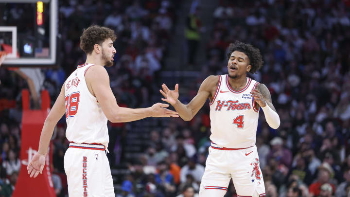 Jan 6, 2024; Houston, Texas, USA; Houston Rockets guard Jalen Green (4) celebrate with center Alperen Sengun (28) after a play during the second quarter against the Milwaukee Bucks at Toyota Center. Mandatory Credit: Troy Taormina-USA TODAY Sports