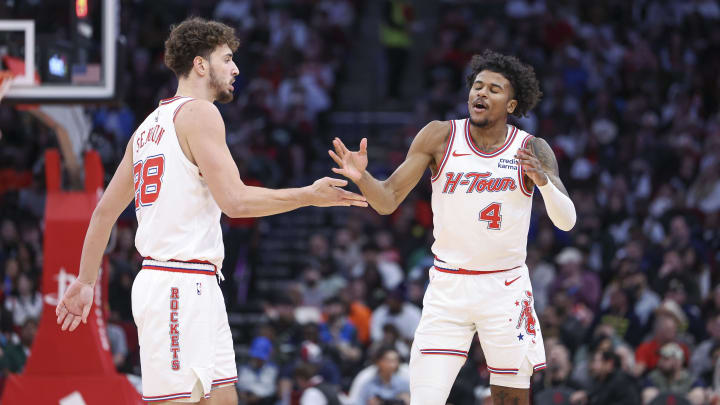 Jan 6, 2024; Houston, Texas, USA; Houston Rockets guard Jalen Green (4) celebrate with center Alperen Sengun (28) after a play during the second quarter against the Milwaukee Bucks at Toyota Center. Mandatory Credit: Troy Taormina-USA TODAY Sports