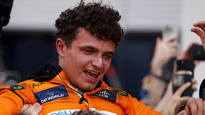 May 5, 2024; Miami Gardens, Florida, USA; McLaren driver Lando Norris (4) celebrates with his team after winning the F1 Miami Grand Prix at Miami International Autodrome. Mandatory Credit: Peter Casey-USA TODAY Sports