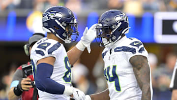 Jan 5, 2025; Inglewood, California, USA;  Seattle Seahawks wide receiver DK Metcalf (14) is congratulated by tight end Noah Fant (87) after a touchdown in the first half against the Los Angeles Rams at SoFi Stadium. Mandatory Credit: Jayne Kamin-Oncea-Imagn Images