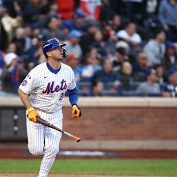 Oct 18, 2024; New York City, New York, USA; New York Mets first baseman Pete Alonso (20) celebrates his three run home run during the first inning against the Los Angeles Dodgers during game five of the NLCS for the 2024 MLB playoffs at Citi Field. Mandatory Credit: Vincent Carchietta-Imagn Images