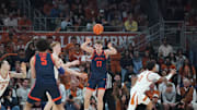 Dec 3, 2025; Austin, Texas, USA; Virginia Cavaliers center Johann Grunloh (17) passes during the first half against the Texas Longhorns at Moody Center. Mandatory Credit: Dustin Safranek-Imagn Images