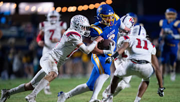 DCA's Carson Sneed (2) runs after a catch with Tipton-Rosemark's Tanner Thornell (12) trying to tackle him during their Division II-A playoff game at Donelson Christian Academy in Nashville, Tenn., Friday, Nov. 8, 2024.