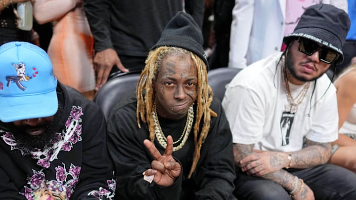 Recording artist Lil Wayne poses before game four of the 2023 NBA Finals between the Miami Heat and Denver Nuggets