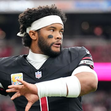 Oct 5, 2025; Glendale, Arizona, USA; Arizona Cardinals quarterback Kyler Murray (1) warms up before their game against the Tennessee Titans at State Farm Stadium. Mandatory Credit: Joe Camporeale-Imagn Images