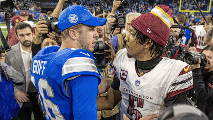 Detroit Lions quarterback Jared Goff (16) congratulates Washington Commanders quarterback Jayden Daniels (5) 