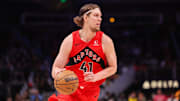 Jan 23, 2025; Atlanta, Georgia, USA; Toronto Raptors forward Kelly Olynyk (41) dribbles against the Atlanta Hawks in the third quarter at State Farm Arena. Mandatory Credit: Brett Davis-Imagn Images